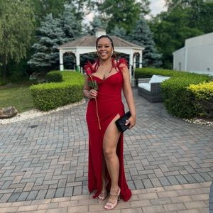 Red formal dress with feather